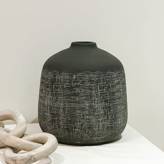 Etched stone charcoal vase